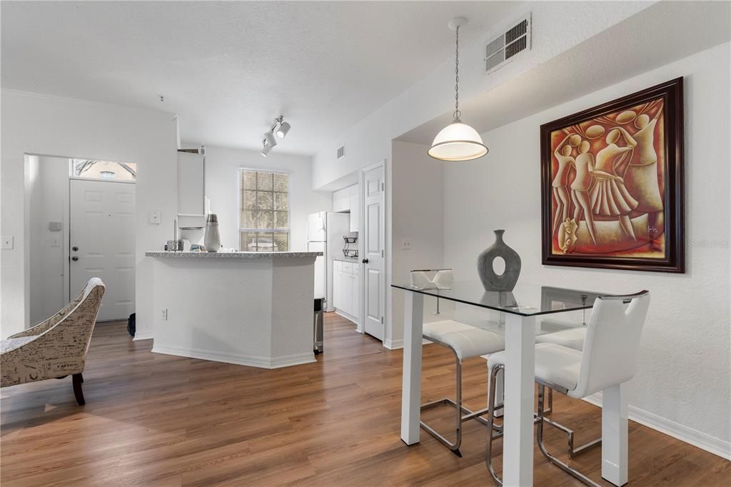 Open kitchen conveniently located adjacent to the dining room and opening up to the living room.