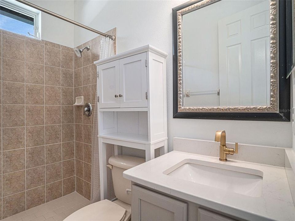 3rd Full Bathroom with Shower off of the Pool/Lanai