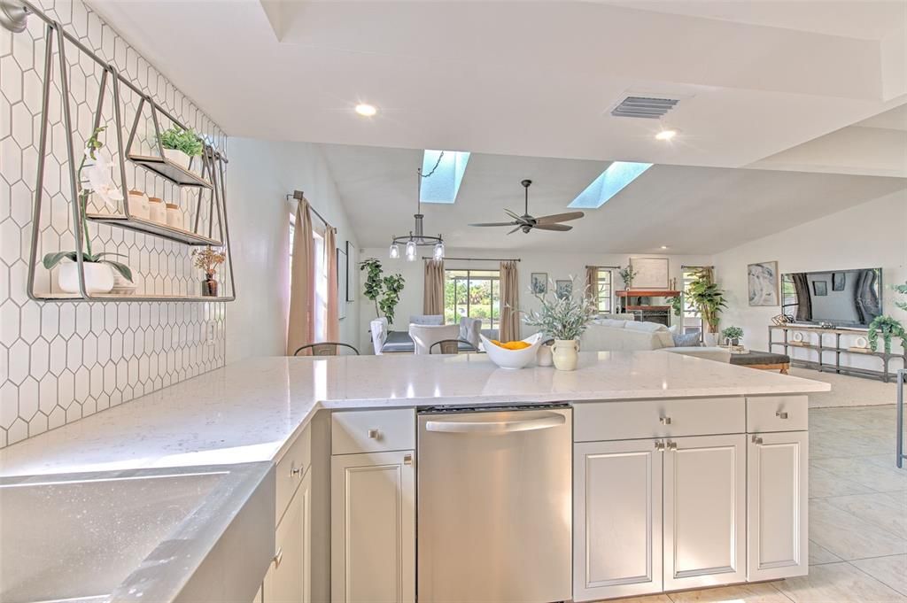 Kitchen overlooks main areas