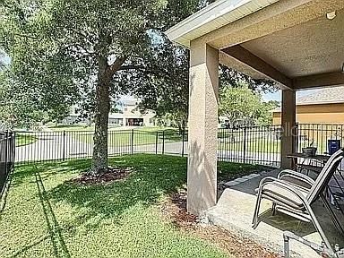 Fenced Backyard and Covered Porch