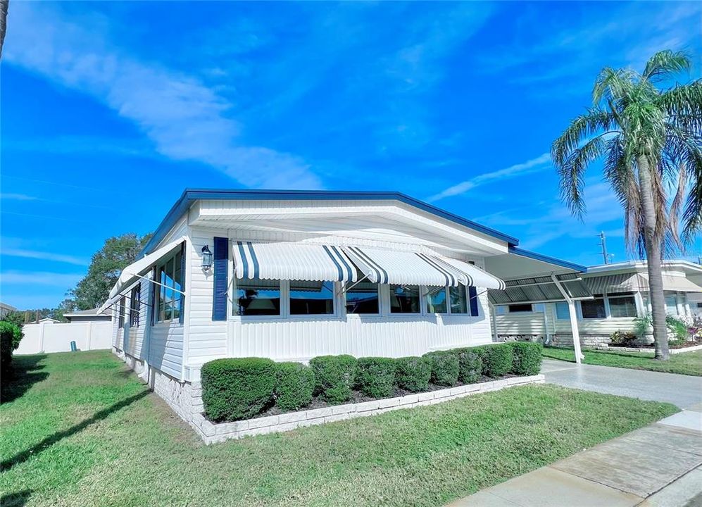 Southwest side of home with enclosed decorative block