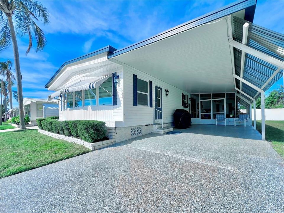 Extended carport and decorative driveway