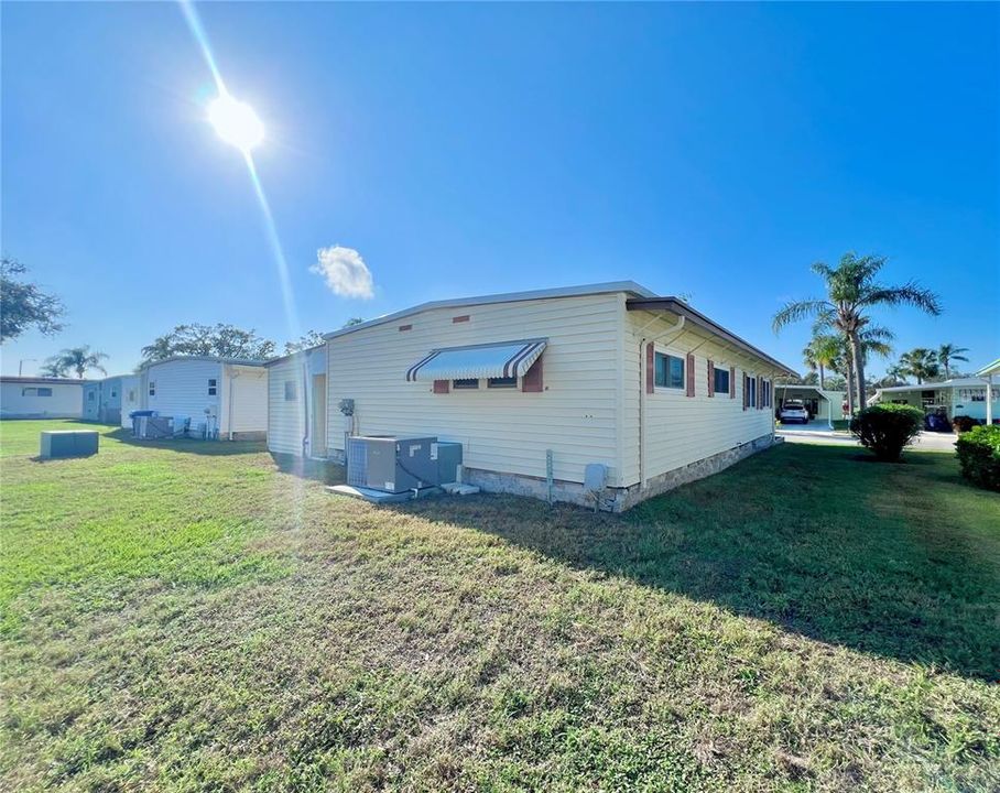 Northeast rear and side of home