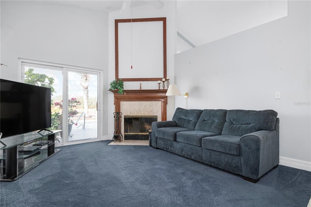 Family room with wood burning fireplace