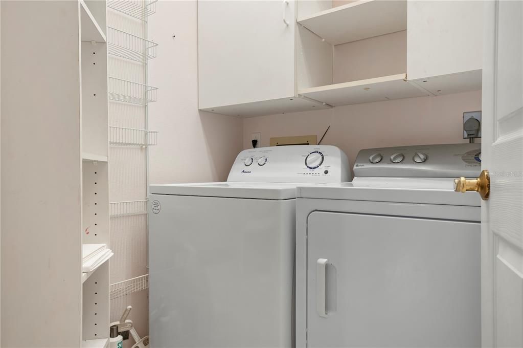 Utility room. Washer and dryer stay.