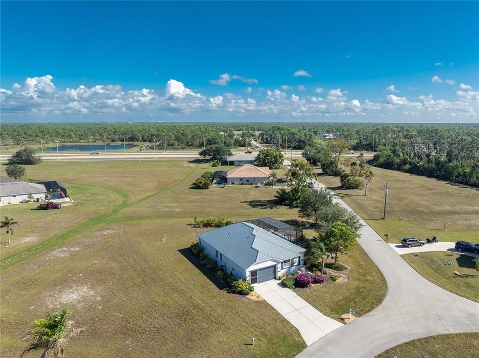 Aerial view of the home and area