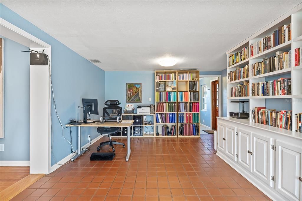 Florida Room leads to the laundry Room to back Patio