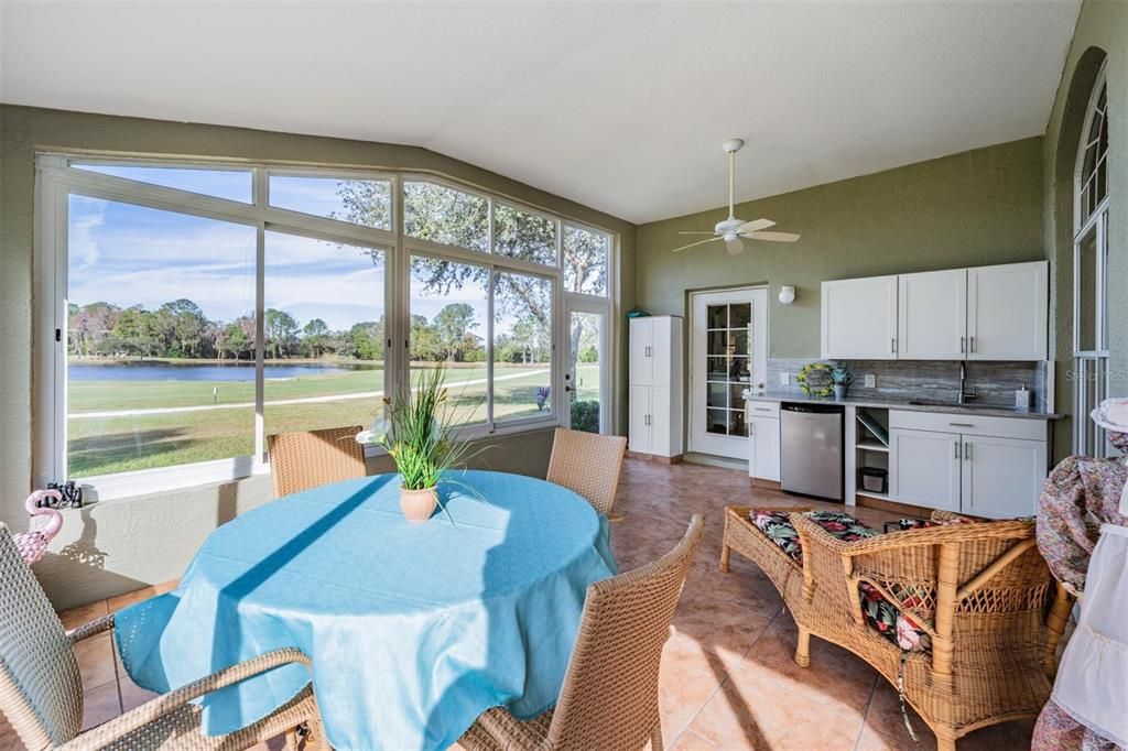 The kitchenette compliments the lanai with STUNNING pond and golf views!