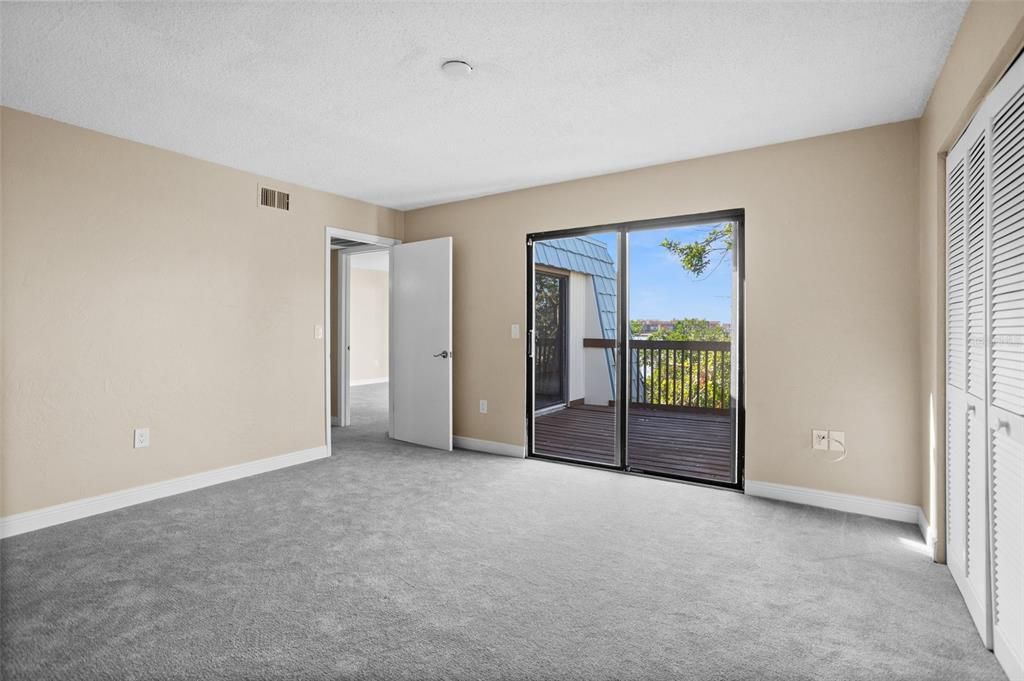 bedroom with balcony