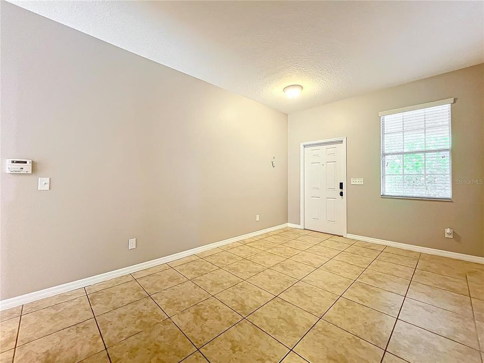 The painted room that welcomes you in the home from the front door.