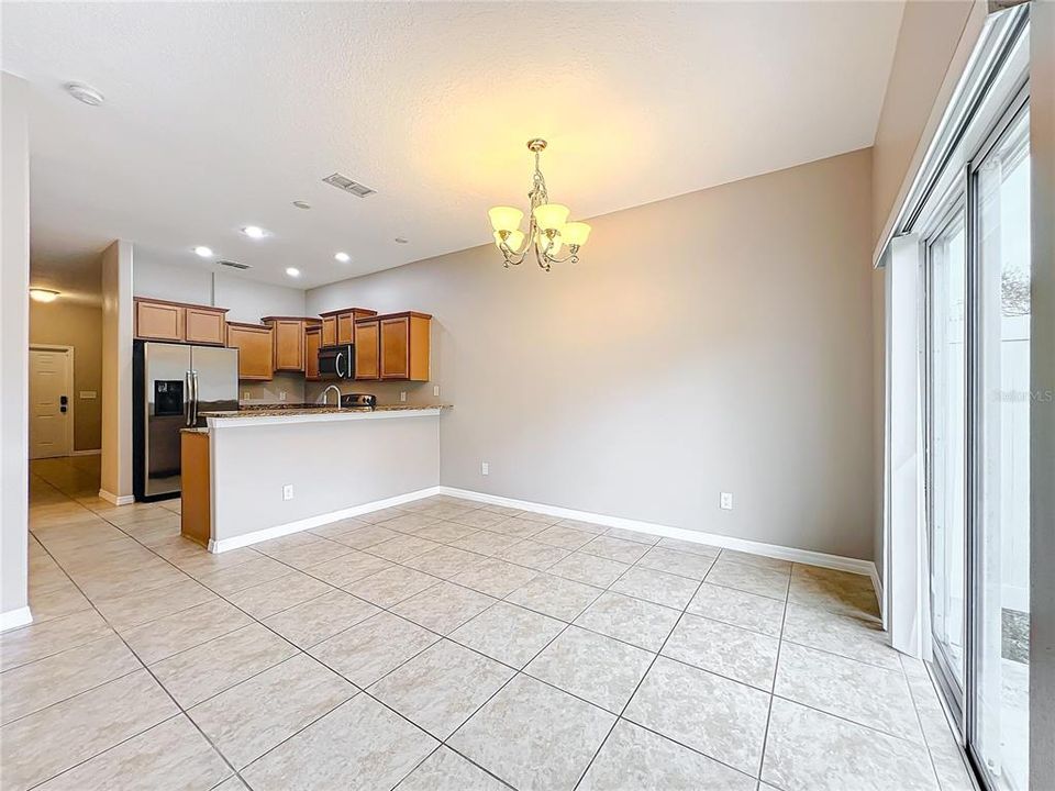 Looking to the kitchen and dining area from the living room.