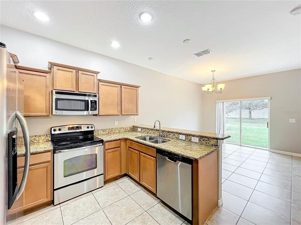 The unit has stainless steel appliances that convey with the sale.