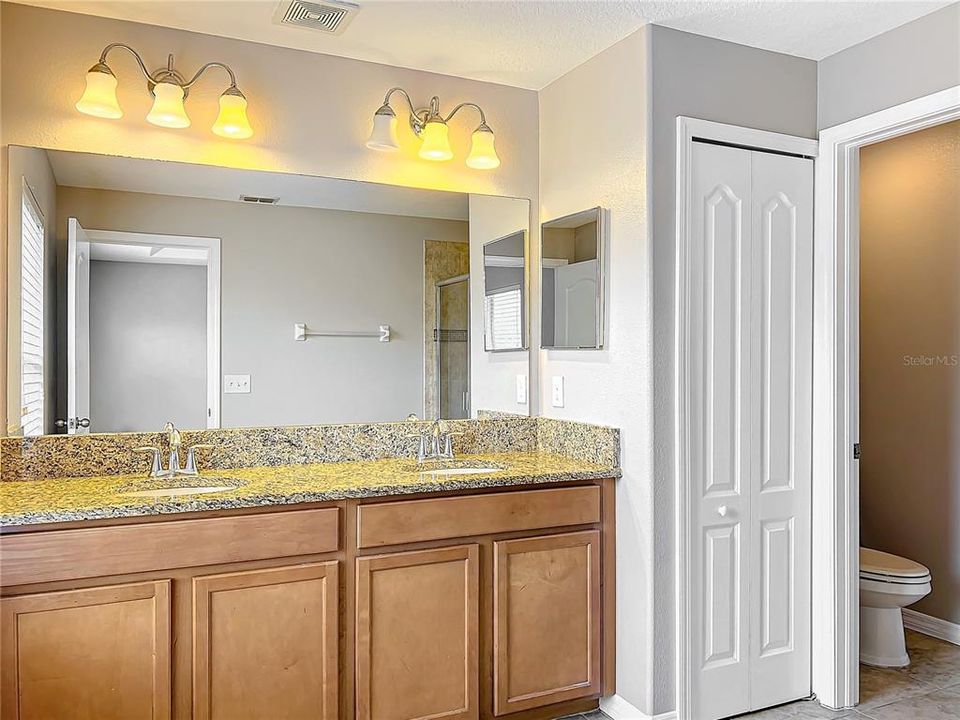 Dual sink vanity in the primary bathroom.