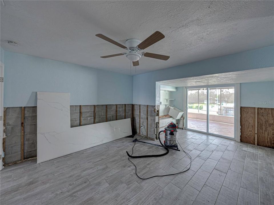 Primary Bedroom With Sliders To Porch