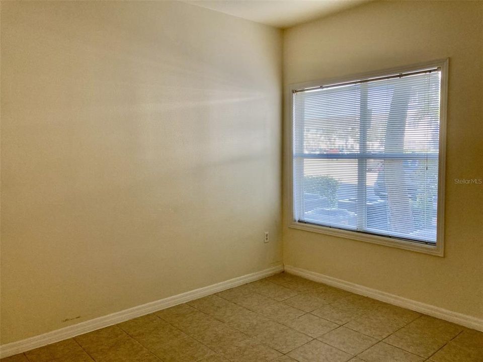 Bedroom - tile floors.