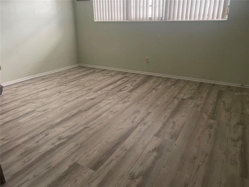 Brand new luxury vinyl flooring in main living areas