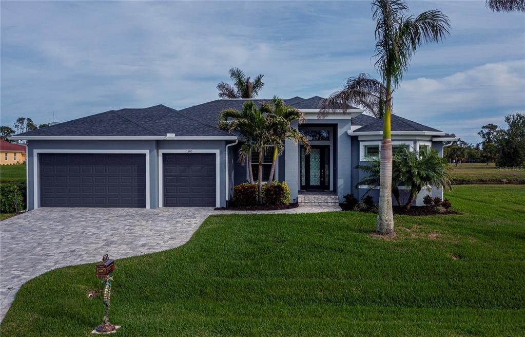 Lush tropical landscaping and St.Augustine grass!