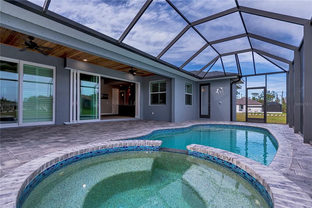 Stylish tongue and groove ceiling! Pocket sliders from the living room! Pool access bathroom!