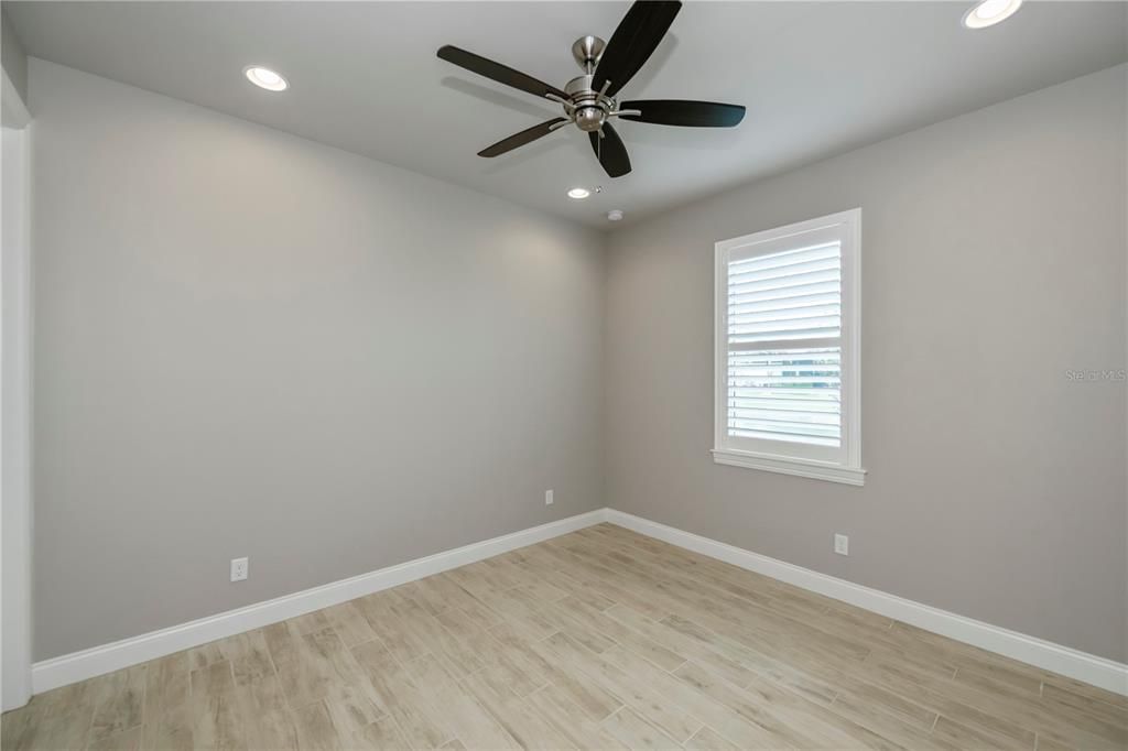 Guest bedroom 1 with walk-in closet