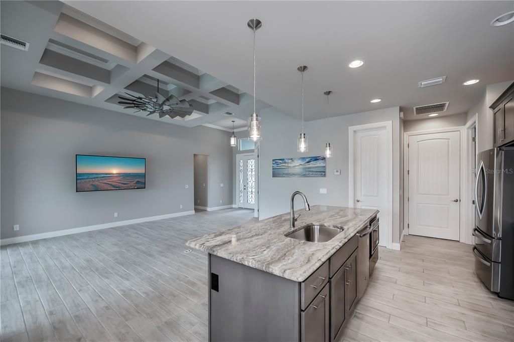 Modern kitchen with pendant lighting and breakfast bar