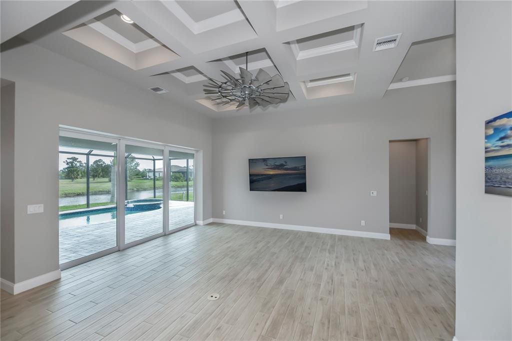 Living room with pocket sliders to the pool