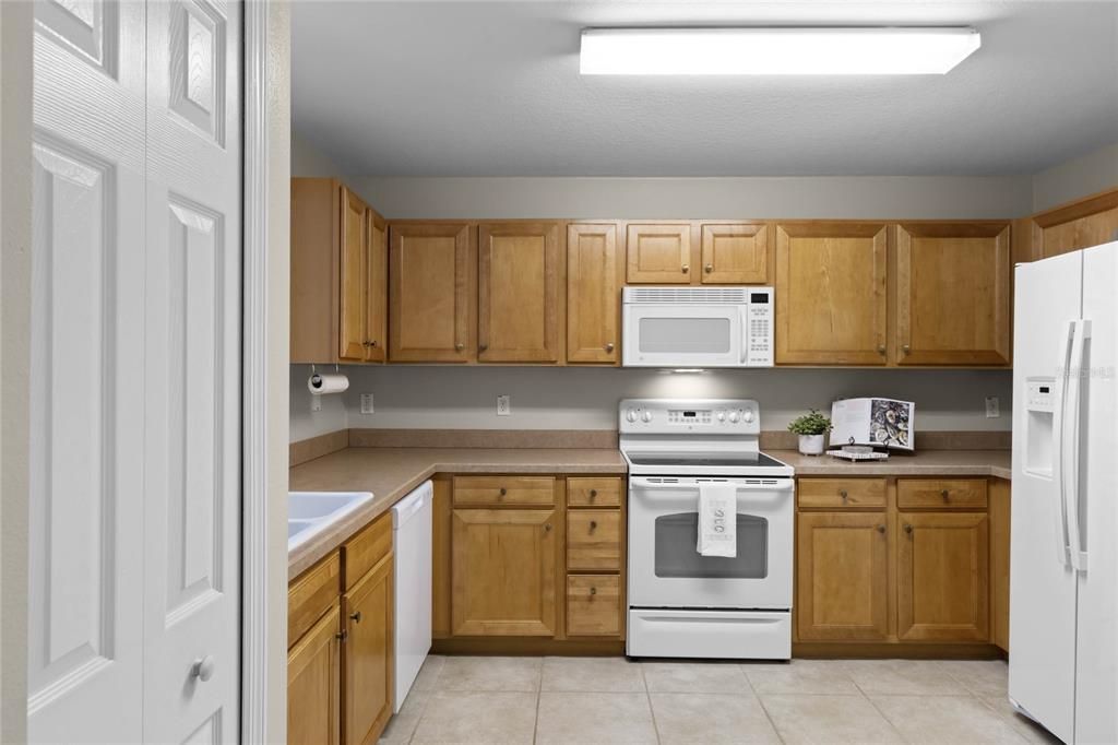 Kitchen features a Closet Pantry & Tiled Flooring