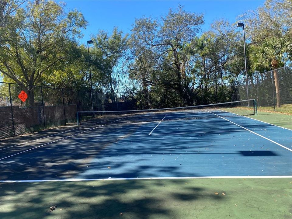 Tennis court completes the resort feel