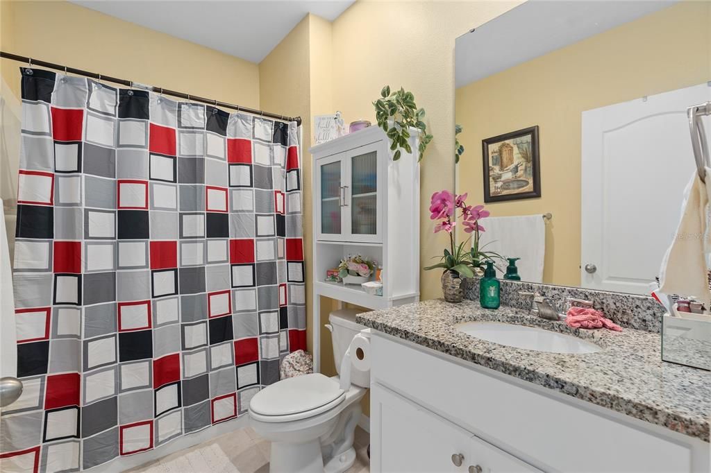 BATHROOM 2, granite countertop with under mount sink and gorgeous white cabinetry