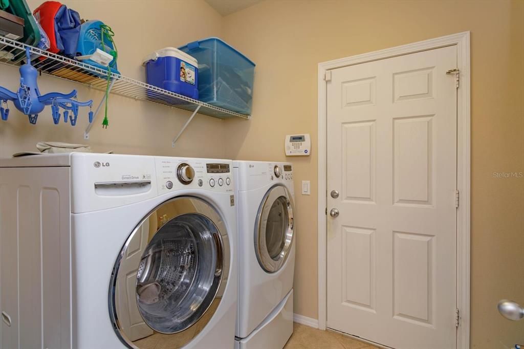 Inside laundry room includes washer and dryer