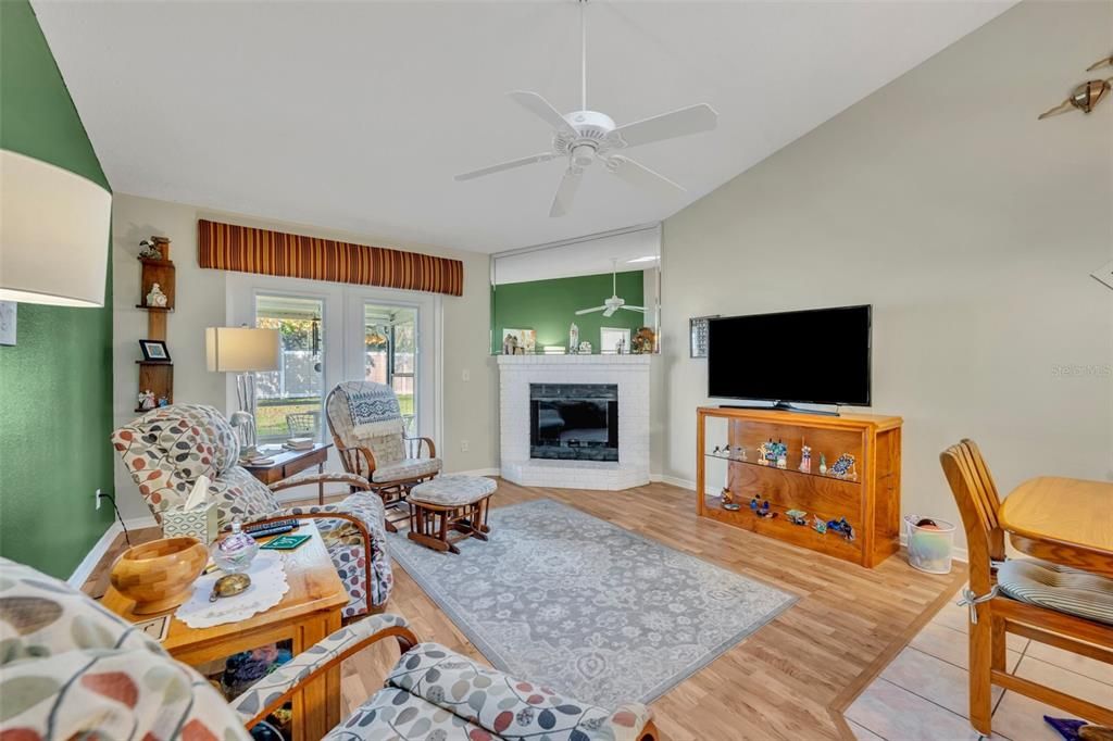 GREAT ROOM WITH FIREPLACE AND VOLUME CEILING