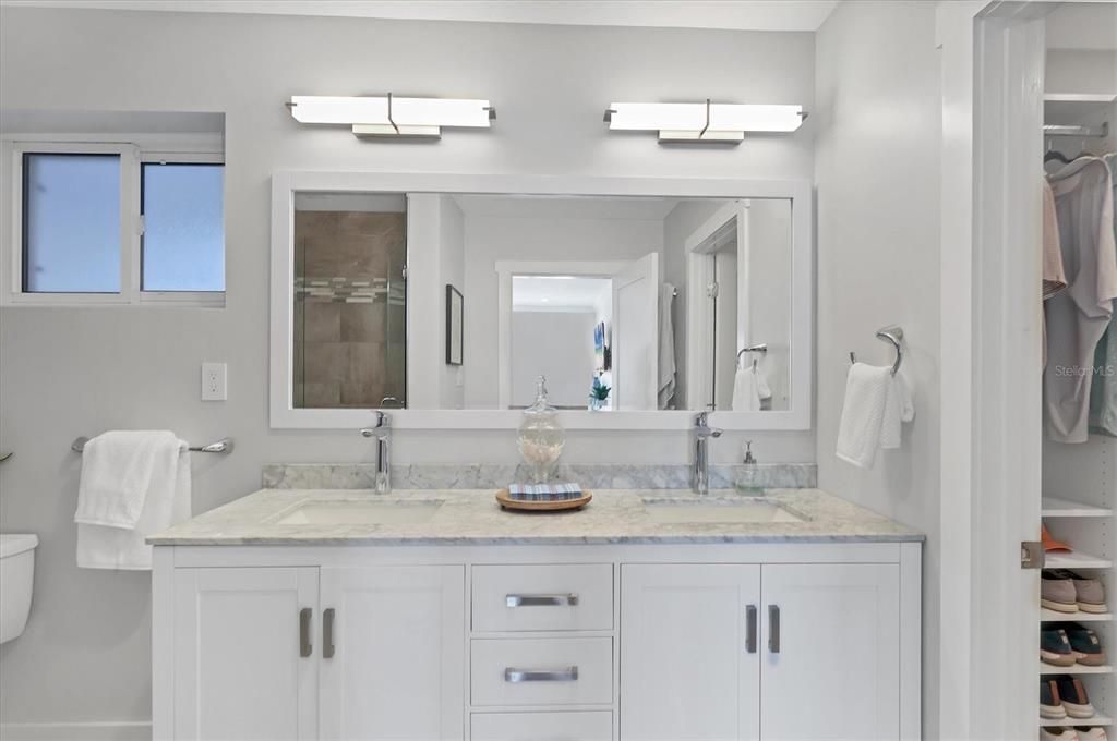 Double vanity with walk in glass shower