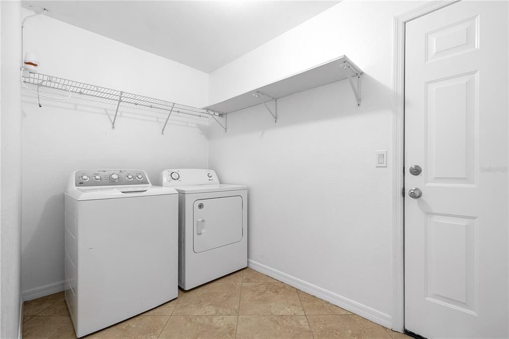 Large Laundry Room on the way to the garage.