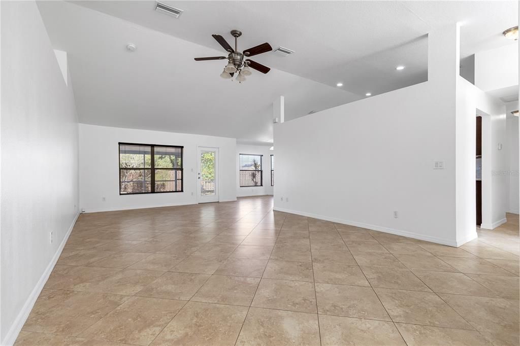 Large Living Room space all tile and vaulted ceilings