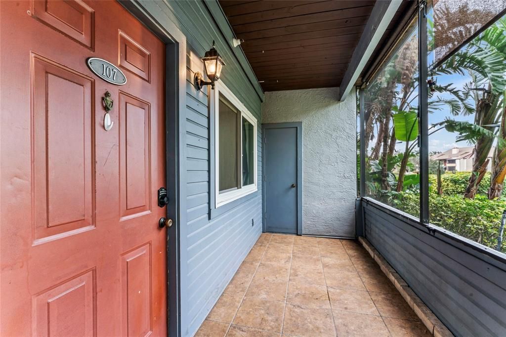 Screened porch with storage.