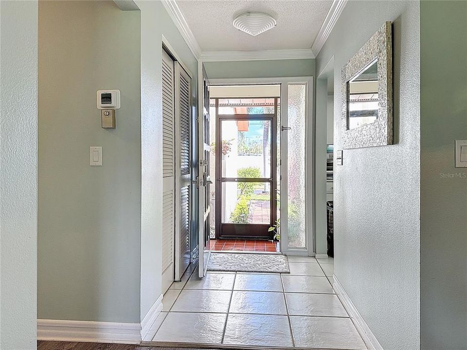 FOYER W/ TILE FLOORING