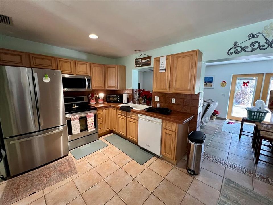 Kitchen with wood cabinets