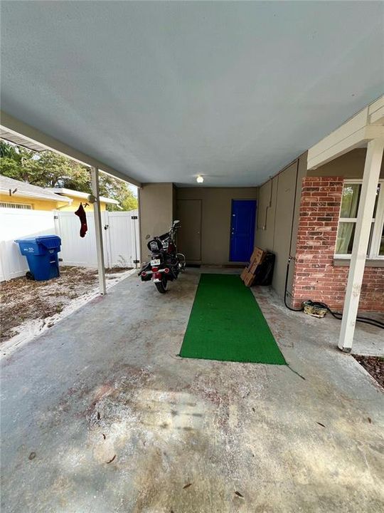 Carport with laundry area and storage