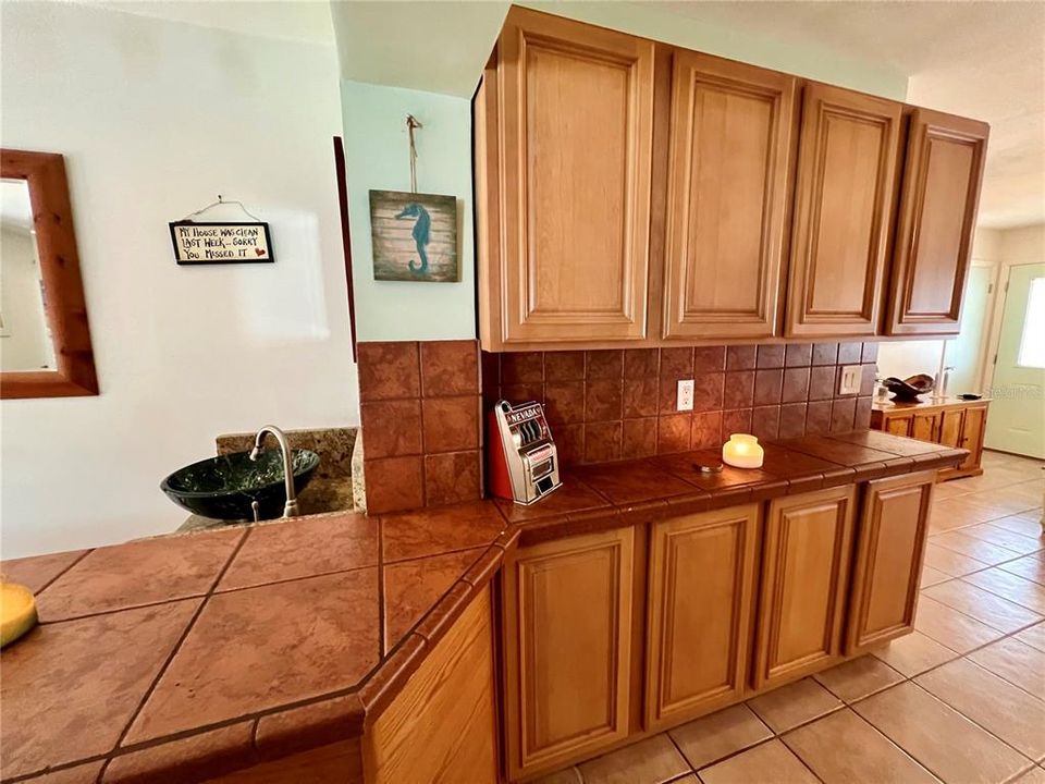 Kitchen with built in storage wall