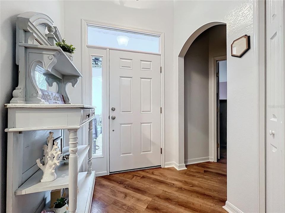 Foyer entrance to the home.  Notice the detail of the arched doorways.