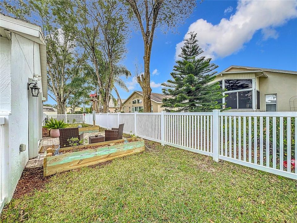 Back patio and fenced in back yard