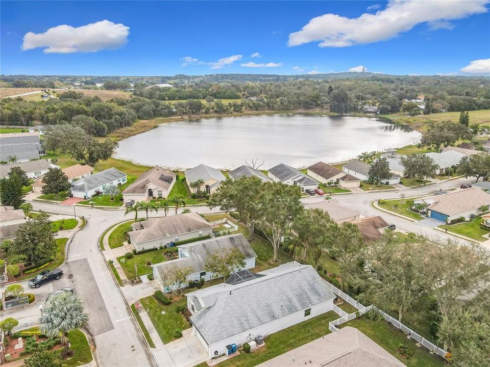 Aerial view of the home with Lae Suzanne showing in the background