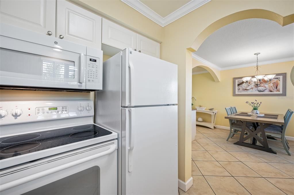 Kitchen off of foyer & dining