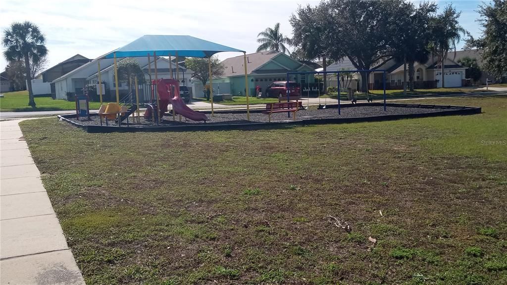 PARK WITH PLAYGROUND EQUIPMENT