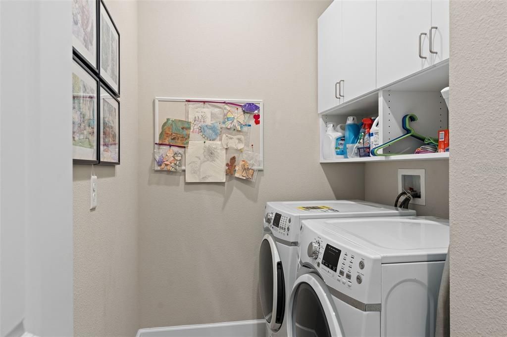 Laundry Room with additional cabinetry for extra storage