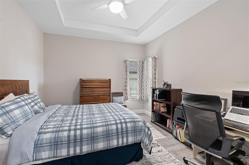 Office / Flex Room with a Tray Ceiling. The seller's are utilizing this rom as an additional bedroom.