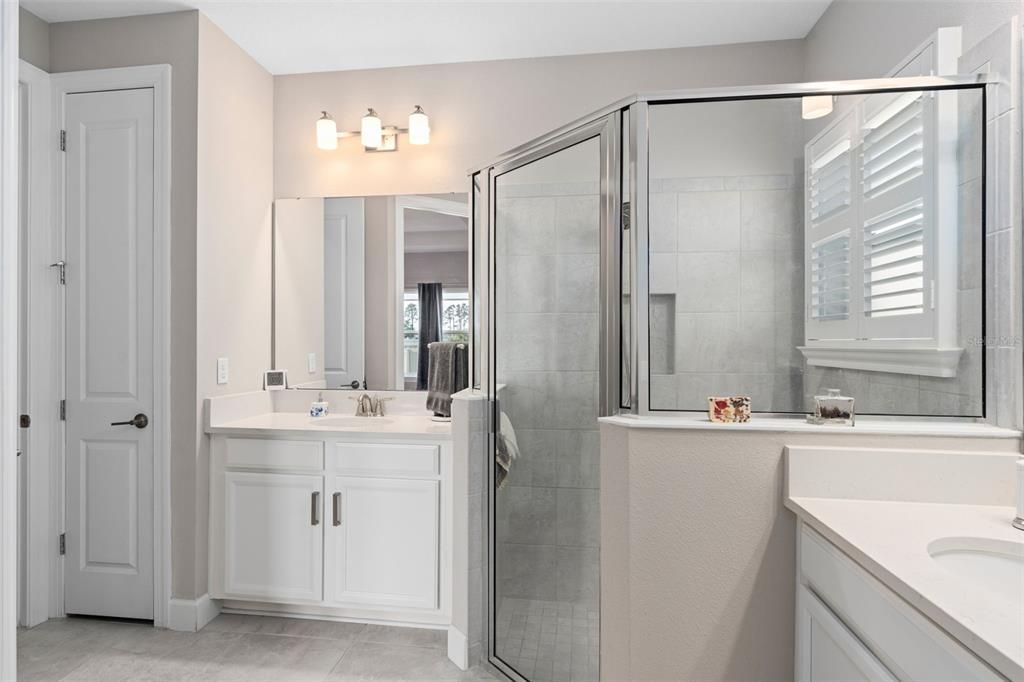 The Primary Bathroom offers Split Comfort Height Vanities, Separate Shower with a Seat, Water Closet, Linen Closet and a Walk-In Closet with Organizers.