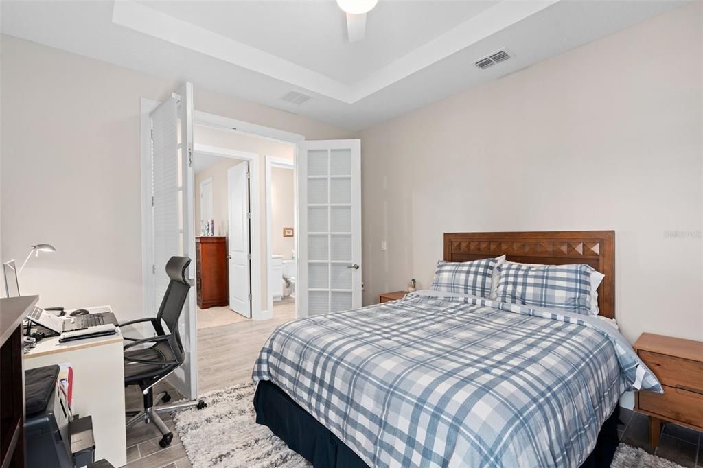 Office / Flex Room with a Tray Ceiling. he seller's are utilizing this rom as an additional bedroom.