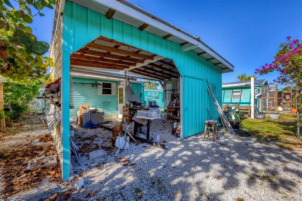 Addition carport behind home