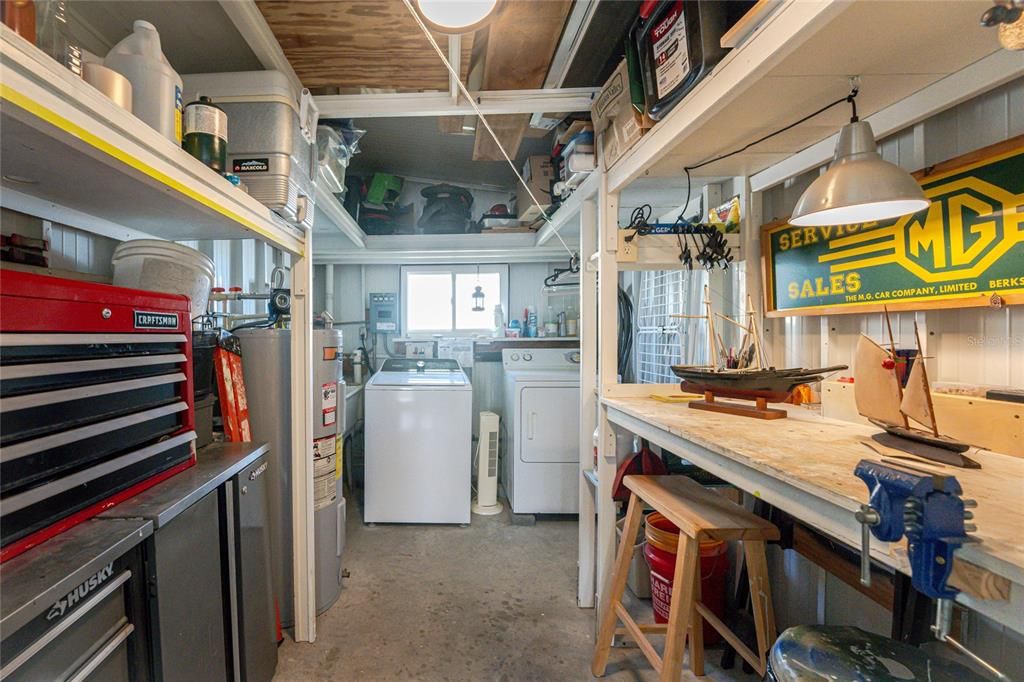 laundry room w/ work bench & storage area