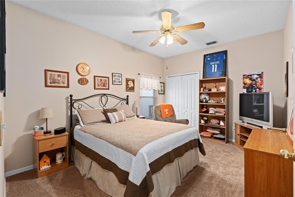 bedroom 2. extremely large secondary bedrooms in this house.